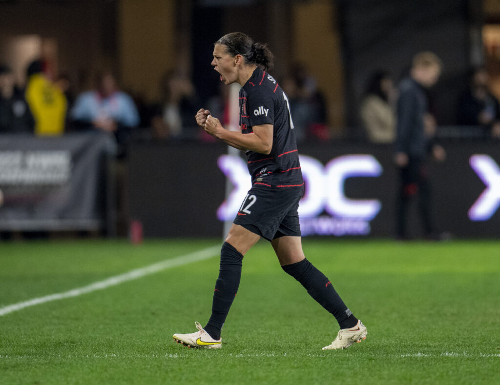 Christine Sinclair yells in triumph during Portland's 2022 NWSL Cup Final.