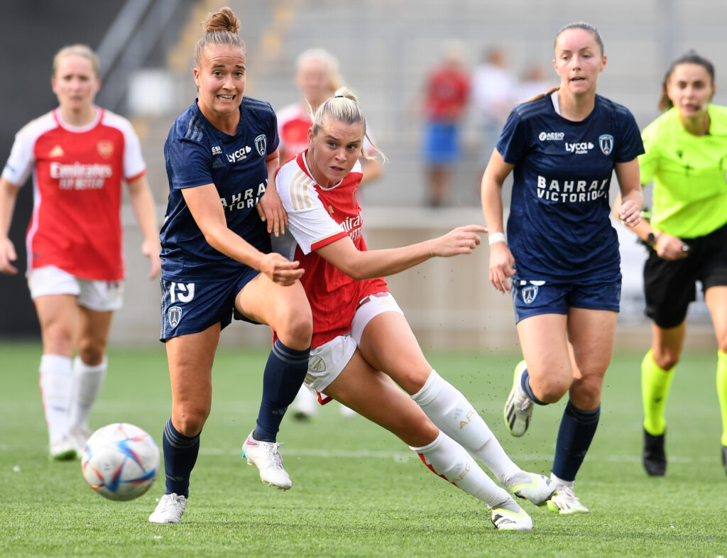 Paris FC's Thea Greboval and Arsenal's Alessia Russo battle for the ball