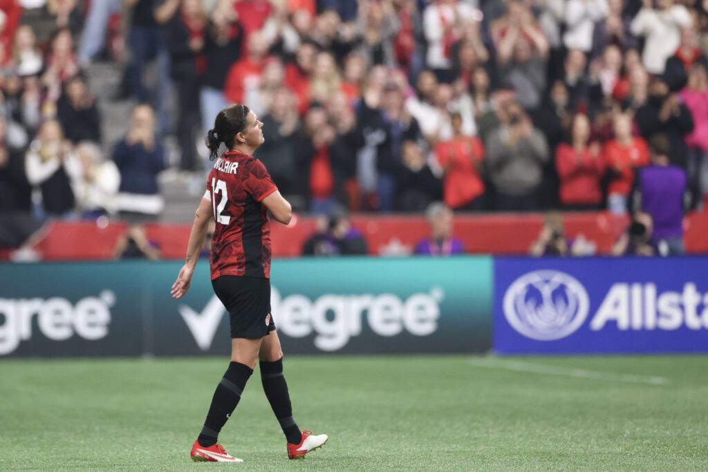 Christine Sinclair walks off the international pitch for the final time.