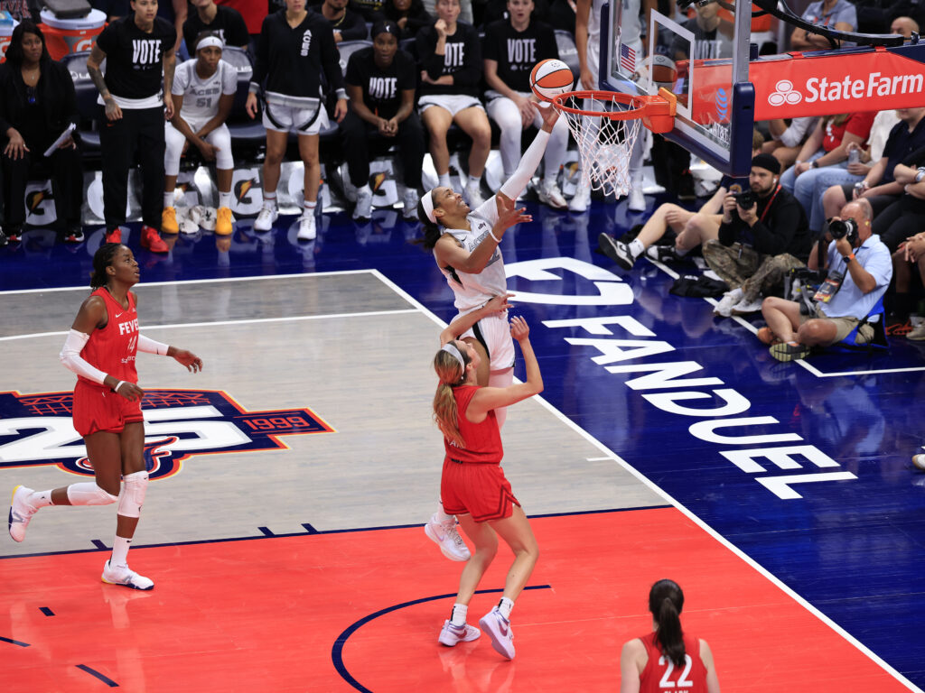 WNBA star A'ja Wilson of the Las Vegas Aces shoots the ball during the game against the Indiana Fever.