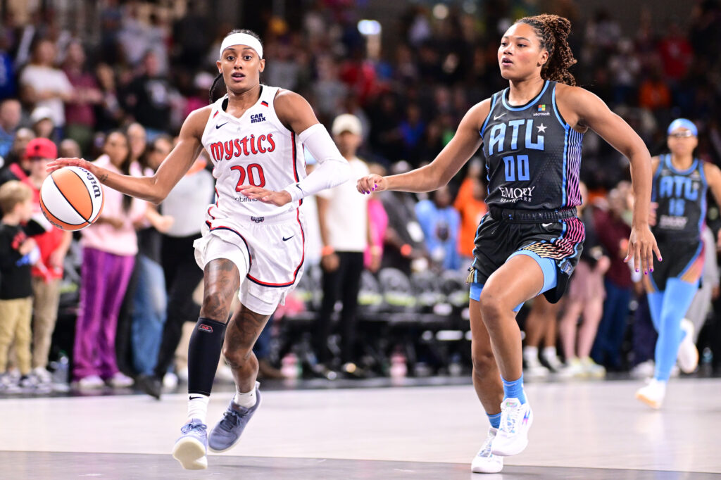 Washington's Brittney Sykes dribbles past Atlanta's Naz Hillmon on Friday.