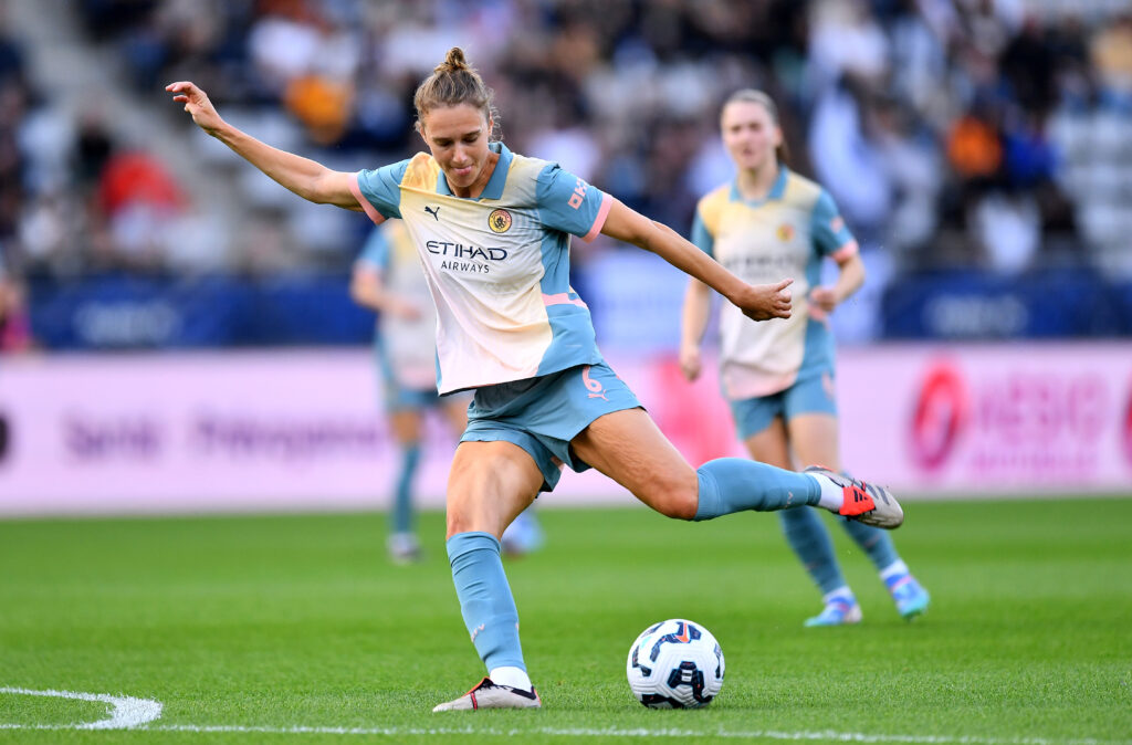 Striker Vivianne Miedema takes a shot in Manchester City's UWCL win over Paris FC.