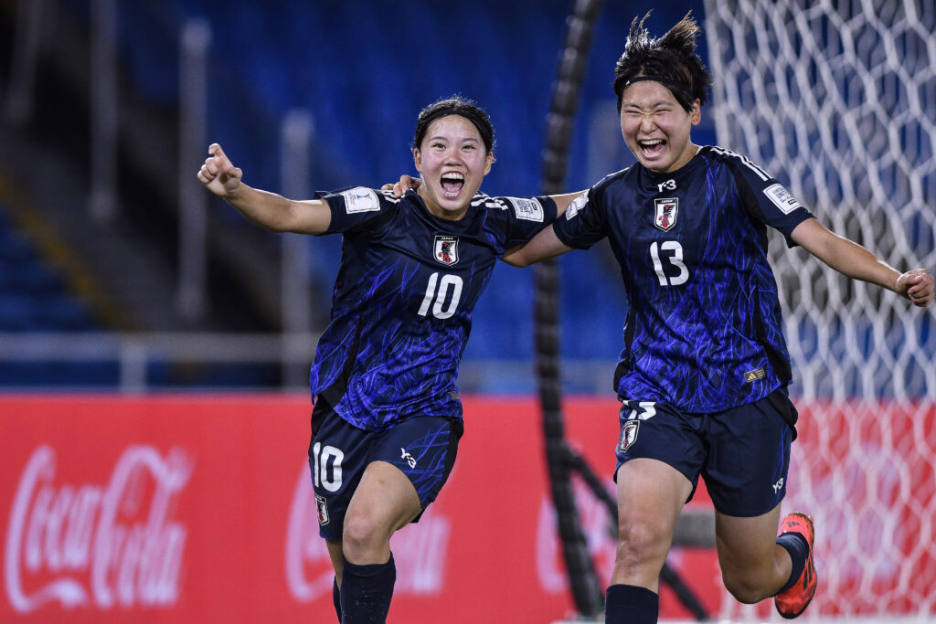 Manaka Matsukubo celebrates one of her two goals with teammate Maya Hijikata in Japan's 2024 U-20 World Cup semifinal win