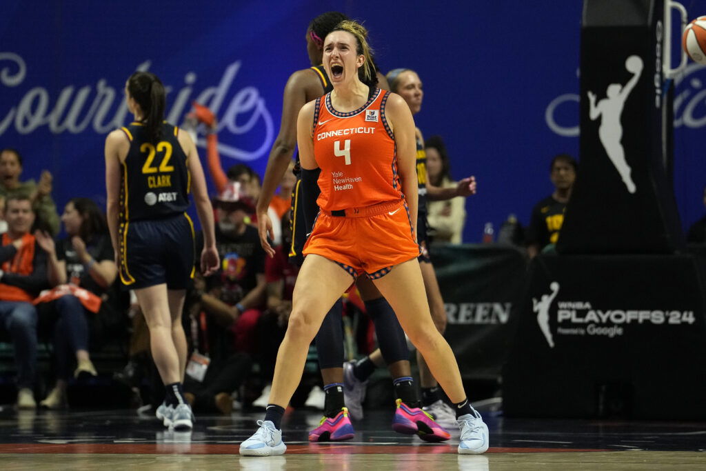 Marina Mabrey triumphantly yells during the Sun's win over Indiana on Sunday.