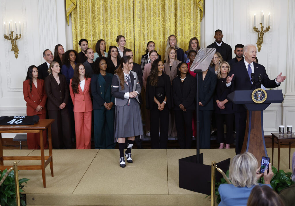 President Joe Biden poses with Gotham FC at a ceremony honoring their 2023 NWSL championship win.