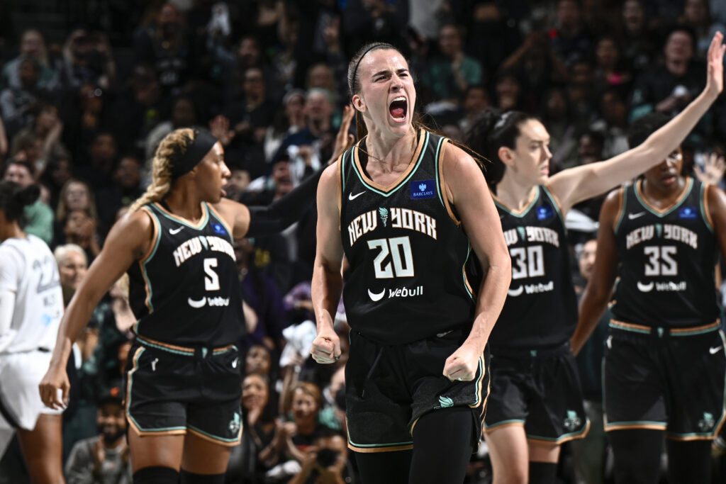 Sabrina Ionescu yells in triumph at the Liberty's win over the Aces in the 2024 WNBA seminfinals