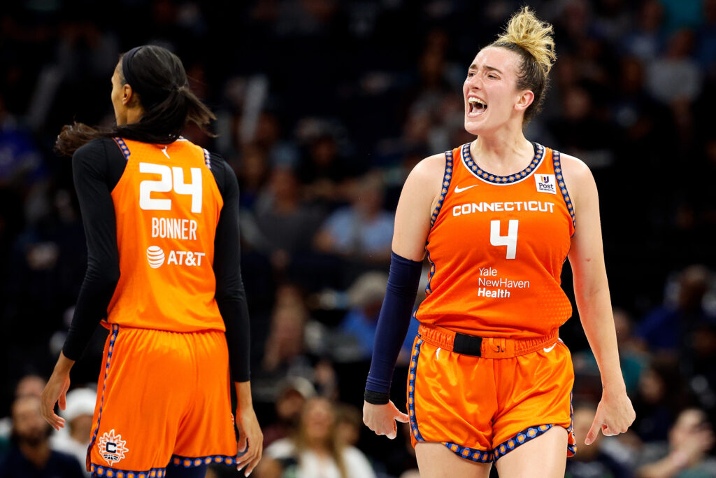 Marina Mabrey celebrates her shot in Connecticut's win over Minnesota in Sunday's WNBA semifinals.