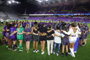 The Orlando Pride circles up after playing Kansas City to a scoreless draw on Friday.