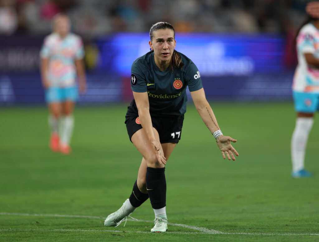 Portland midfielder Sam Coffey argues a call from her slide tackle that resulted in a San Diego penalty