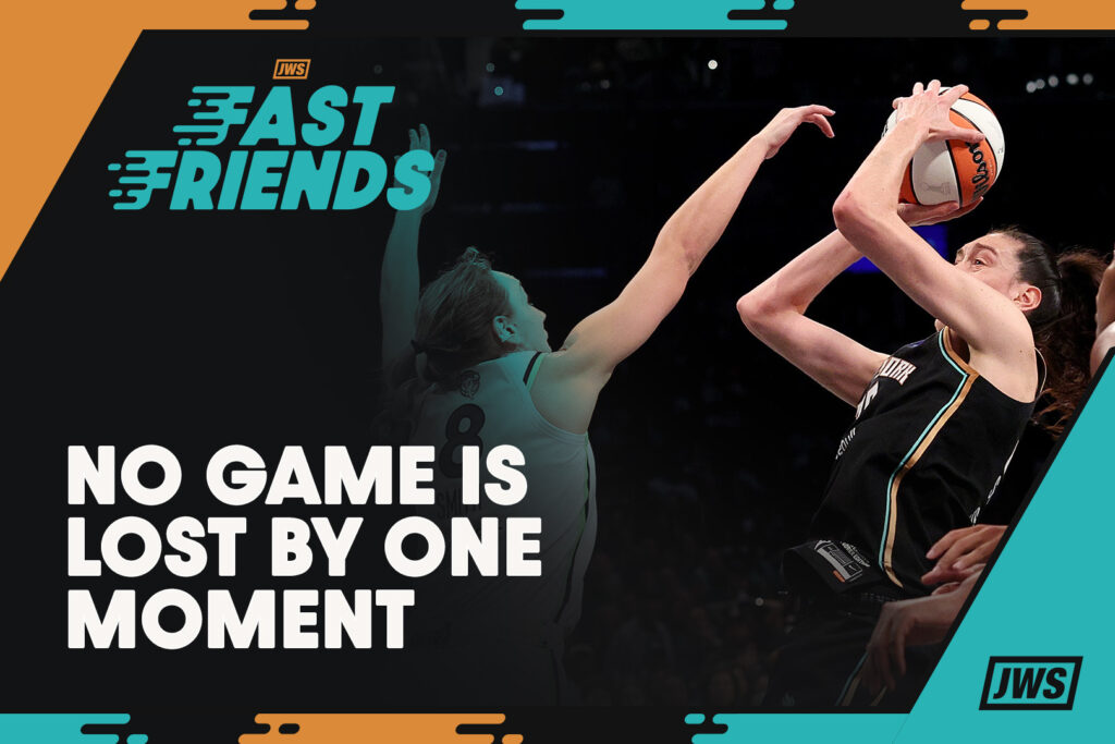 Liberty star Breanna Stewart takes a shot behind the 'Fast Friends' graphic.