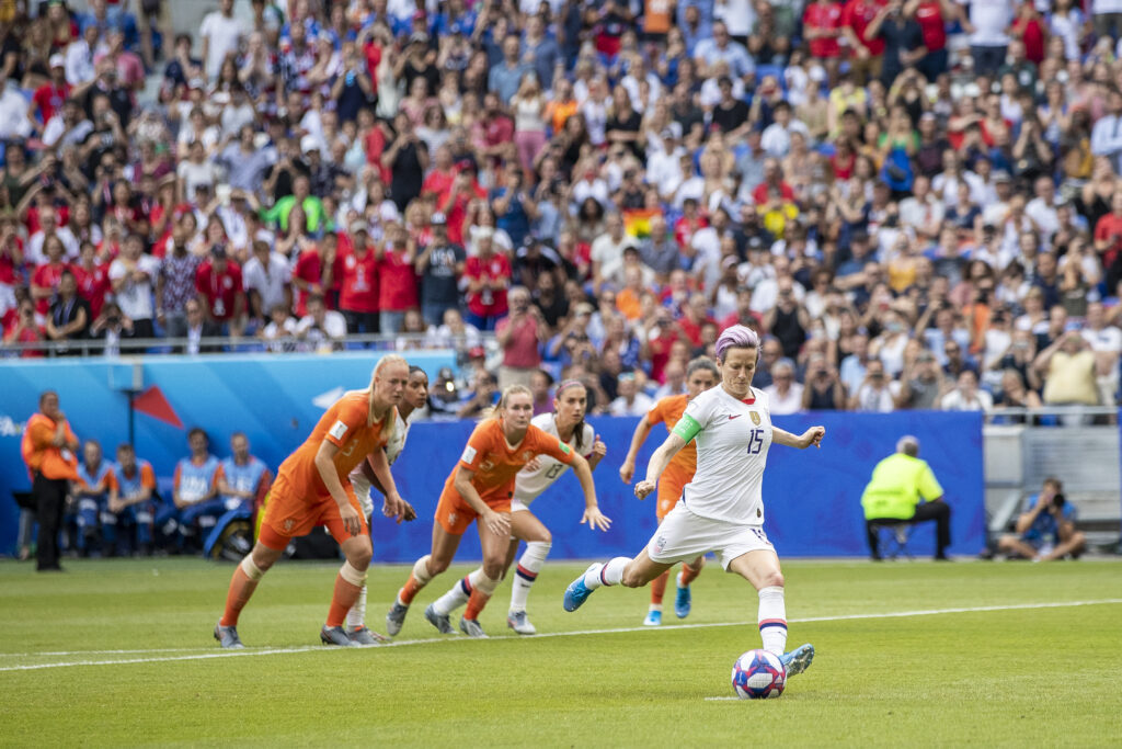 Megan Rapinoe takes a penalty kick to score the USWNT's first goal against the Netherlands in the 2019 World Cup final.