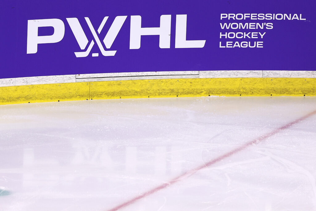 The PWHL logo is displayed on the boards during a January 2024 game.