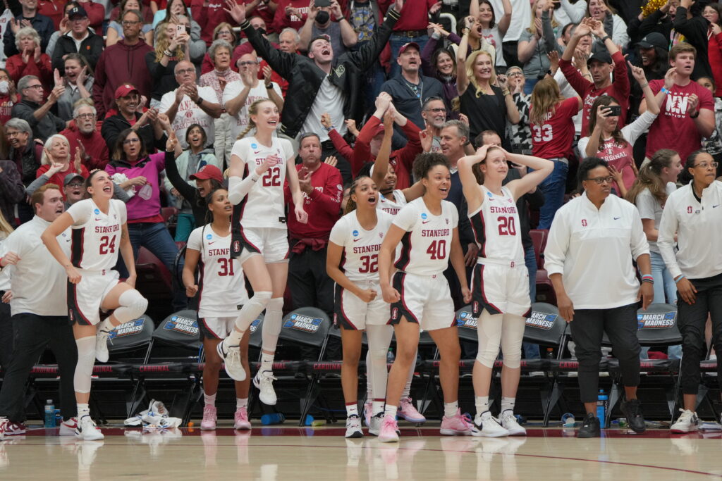 Stanford players react during a 2024 March Madness NCAA women's college basketball game.