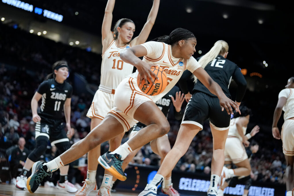 AP NCAA preseason All-America team player Madison Booker dribbles during a Texas college basketball game.