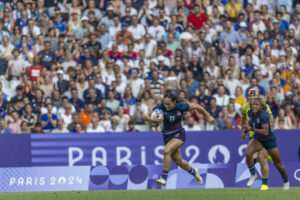 USA Rugby player Alex "Spiff" Sedrick races with the ball to score the game-winning try in the Olympics bronze-medal match.