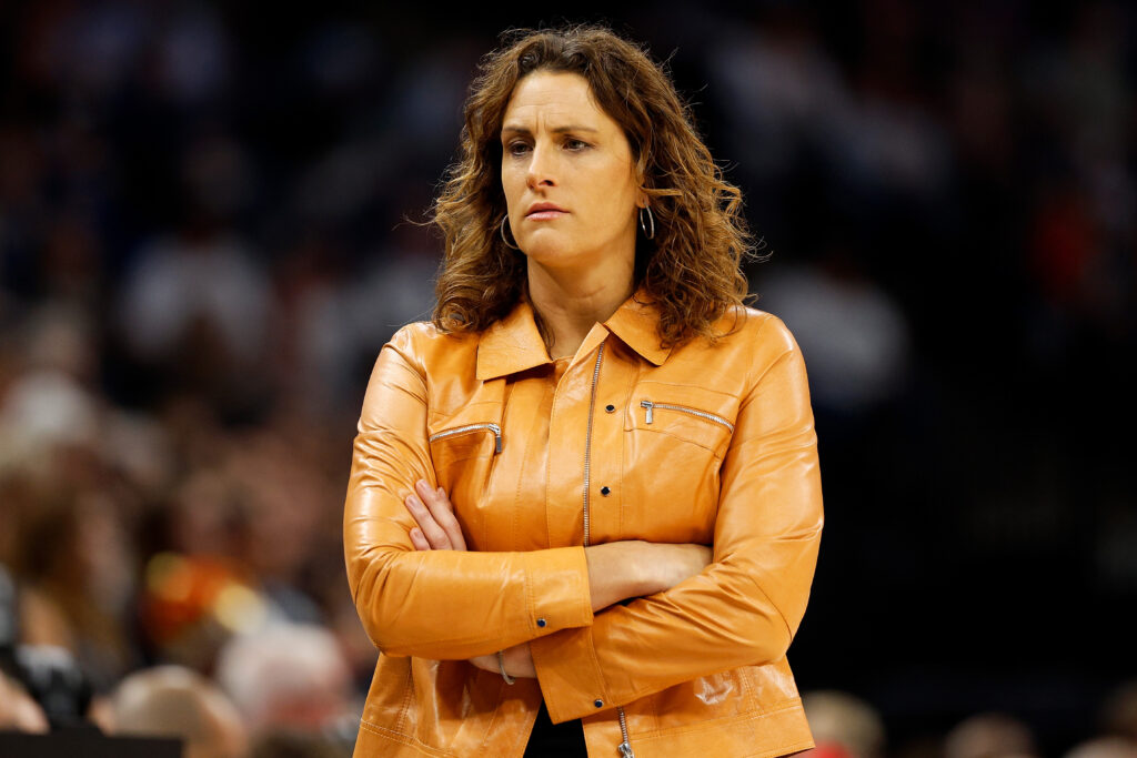 Former Connecticut head coach Stephanie White looks on during a WNBA game.