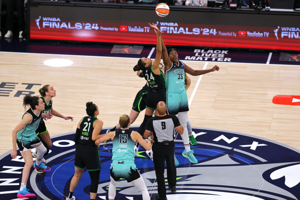 Minnesota's Napheesa Collier and New York's Jonquel Jones tip off Game 3 of the 2024 WNBA Finals.