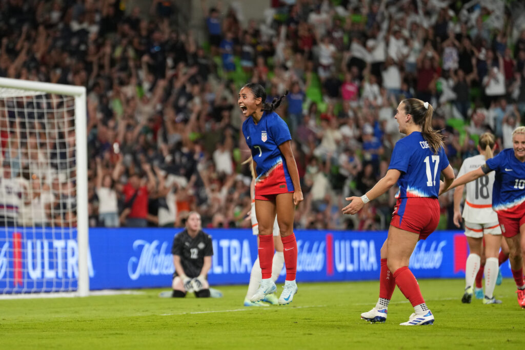 Alyssa Thompson leaps in the air after scoring her first-ever USWNT goal on Thursday.