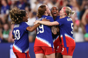 USWNT players celebrate a goal against Iceland on Thursday