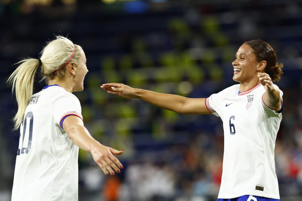 Lynn Williams and Lindsey Horan celebrate a goal in the USWNT win over Iceland on Sunday.