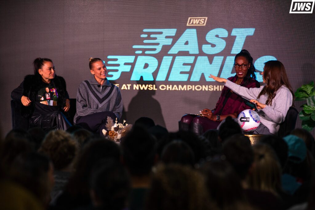 'Fast Friends' hosts Kelley O'Hara and Lisa Leslie on stage with Ali Riley and Merritt Mathias.