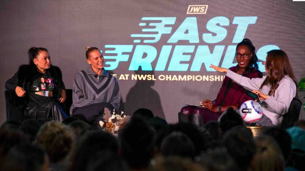 'Fast Friends' hosts Kelley O'Hara and Lisa Leslie on stage with Ali Riley and Merritt Mathias.