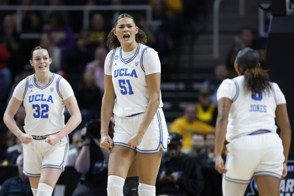 UCLA center Lauren Betts celebrates a play in an NCAA college basketball game.