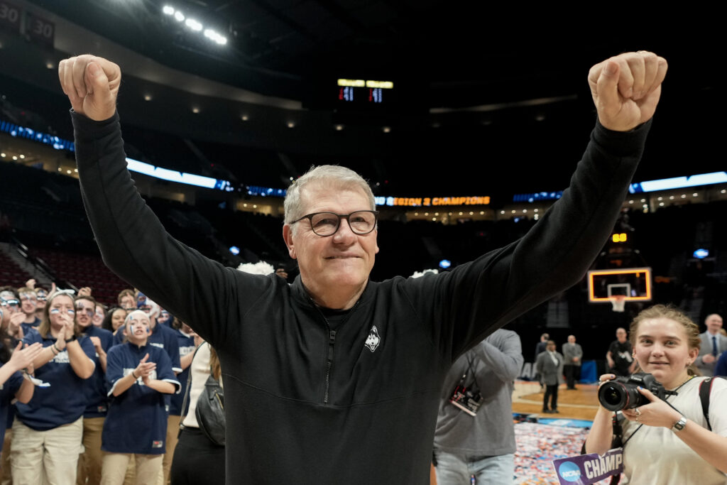 UConn head coach Geno Auriemma celebrates the Huskies' 2024 Elite 8 win.