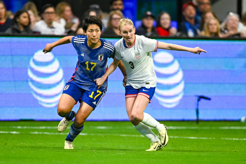 Japan's Seike Kiko and the USWNT's Jenna Nighswonger battle for position during the 2024 SheBelieves Cup.