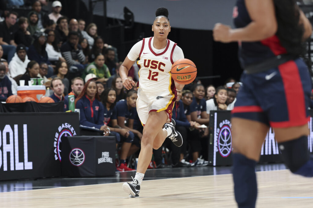 USC sophomore JuJu Watkins dribbled the ball downcourt in Monday's NCAA basketball season opener.