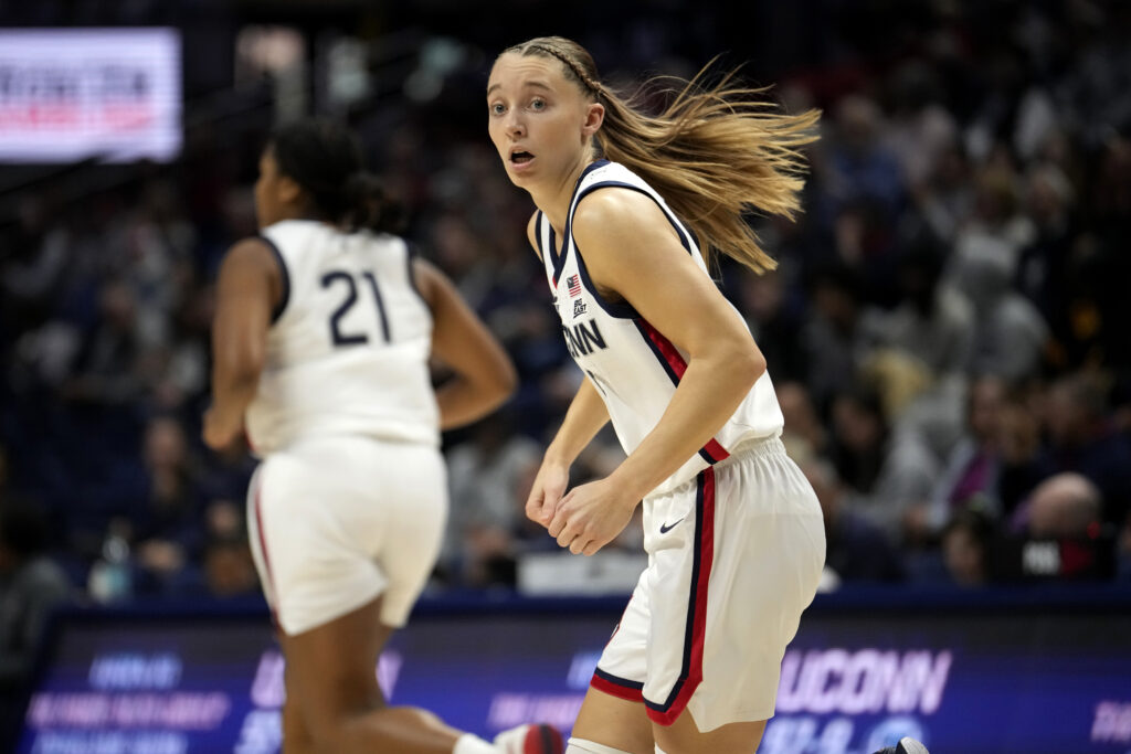 UConn superstar Paige Bueckers looks across the court in a 2024 exhibition game