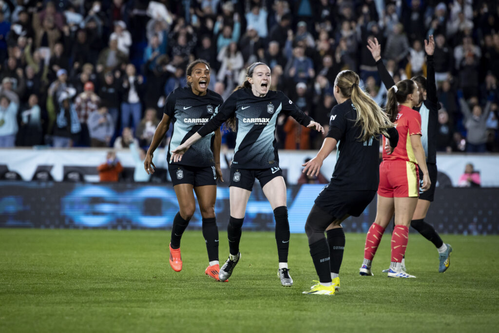 Gotham midfielder Rose Lavelle celebrates her NWSL quarterfinal-winning goal over Portland.