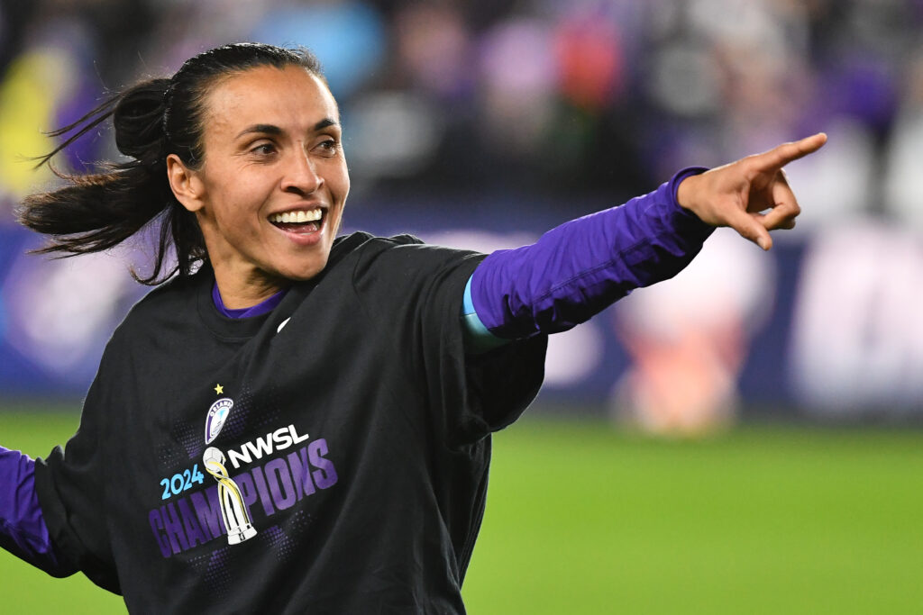 Pride star Marta celebrates Orlando's first-ever NWSL Championship on Saturday.