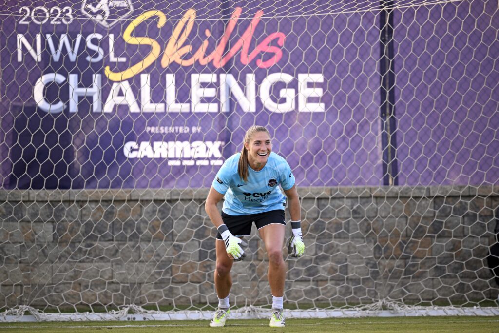 Washington goalkeeper Aubrey Kingsbury smiles during the Shootout event at the 2023 NWSL Skills Challenge.