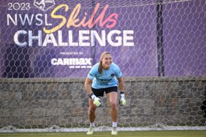 Washington goalkeeper Aubrey Kingsbury smiles during the Shootout event at the 2023 NWSL Skills Challenge.