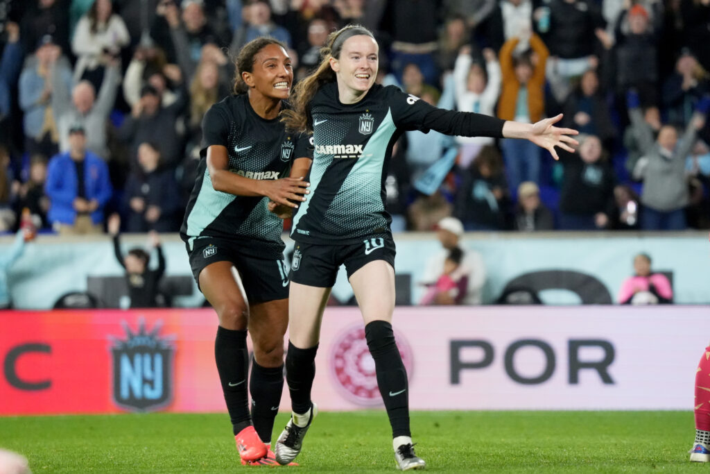 Gotham's Yazmeen Ryan and Rose Lavelle celebrate a goal during their 2024 NWSL quarterfinal.