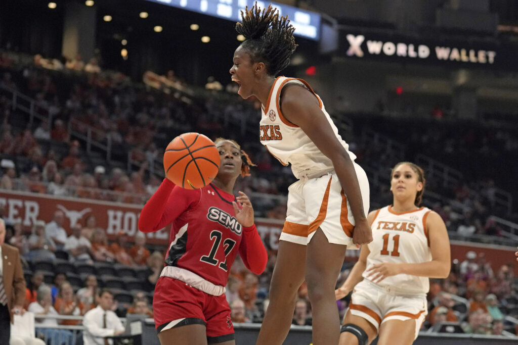 Texas guard Bryanna Preston celebrates a shot in an NCAA college basketball game.