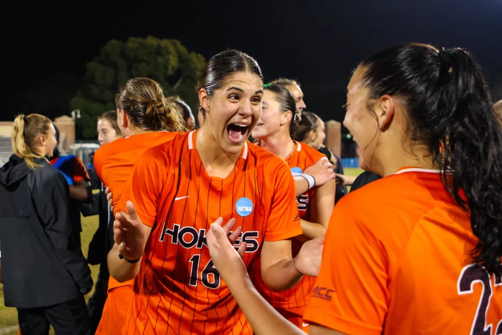 Senior Allie George celebrates No. 7 Virginia Tech's third-round win over No. 3 Iowa on Sunday in the NCAA soccer championship tournament.