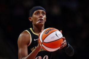 Washington Mystics guard Brittney Sykes lines up a shot.