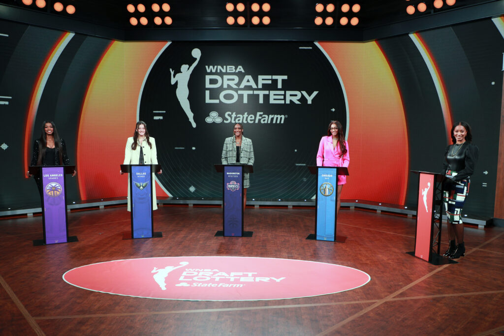 Players representing four teams attend the 2025 WNBA Draft lottery.