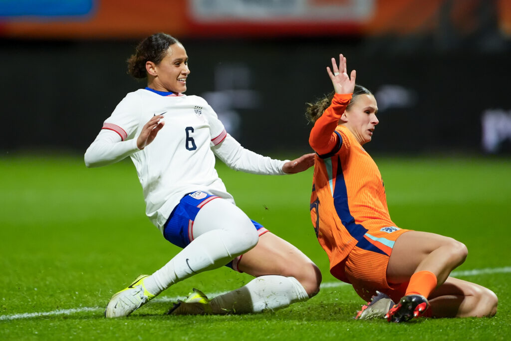 USWNT forward Lynn Williams slides in the game-winning goal against the Netherlands.