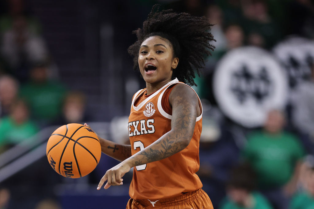 Rori Harmon of the Texas Longhorns dribbles against the Notre Dame Fighting Irish during the first half of an NCAA women's college basketball game at Purcell Pavilion at the Joyce Center in South Bend, Indiana. 