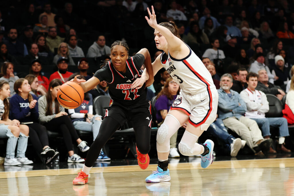 Louisville's Taijanna Roberts tried to dribble past UConn's Morgan Cheli on Saturday.