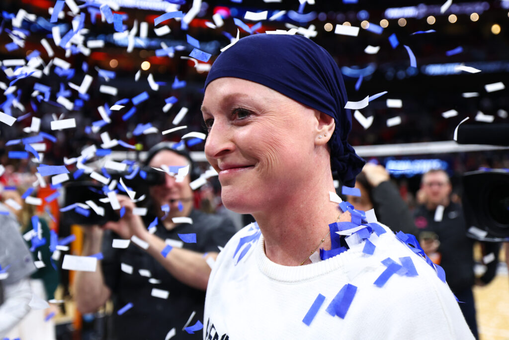 Head Coach Katie Schumacher-Cawley of the Penn St. Nittany Lions celebrates after defeating the Louisville Cardinals to win the NCAA Women's Volleyball Championship.