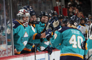 The New York Sirens celebrate a goal by Noora Tulus.