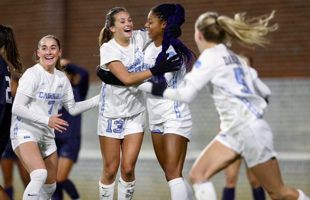 UNC's Kate Faasse celebrates her golden goal with her teammates in the NCAA soccer quarterfinal.