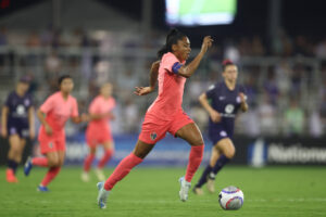 NC Courage forward Kerolin dribbles the ball during a 2024 NWSL match.