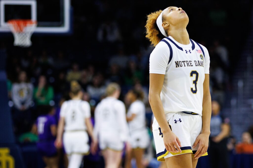 Notre Dame star Hannah Hidalgo looks up in frustration during a women's college ncaa basketball game.