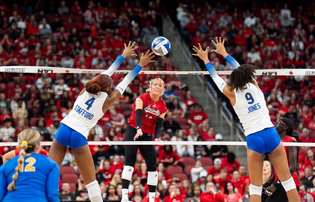 Louisville's Anna DeBeer spikes the ball against ACC rival and fellow NCAA volleyball No. 1 seed Pitt.