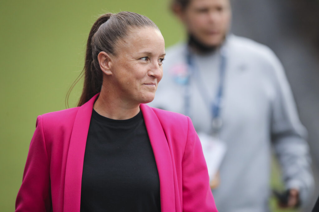 Casey Stoney enters the field before a San Diego Wave match.